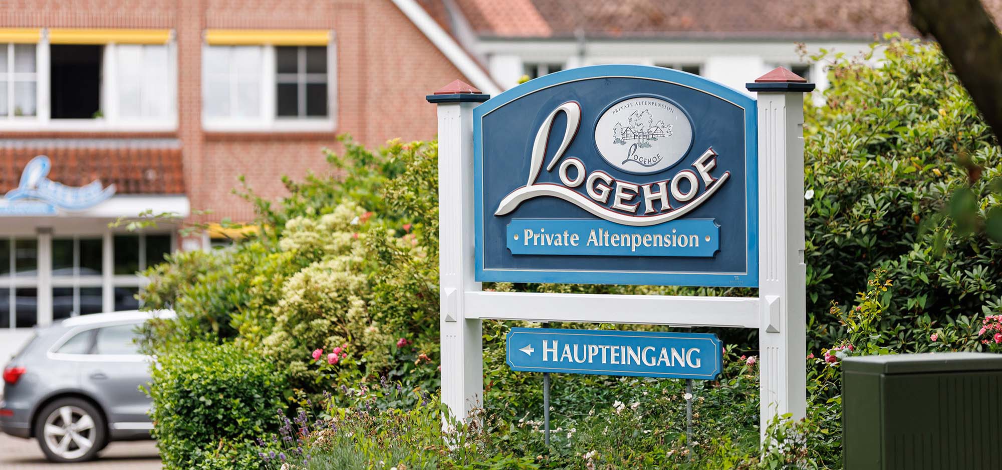 Altenpension Logehof Schild vor Eingang